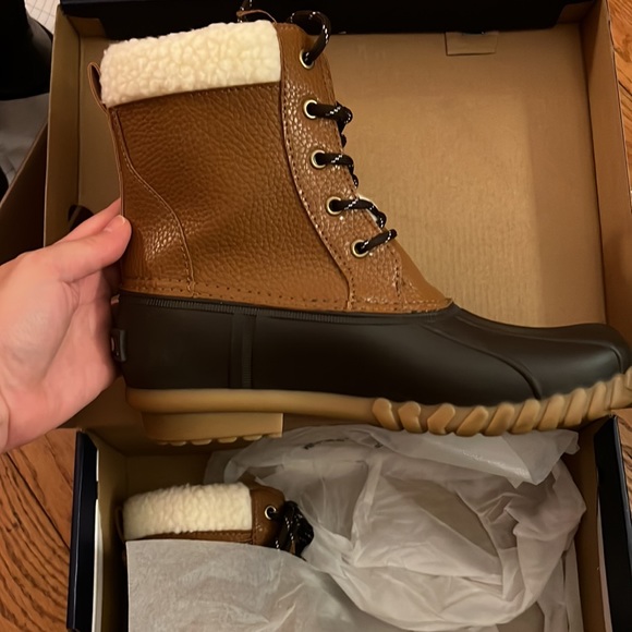 Izod snow duck boots with warm lining inside and buckle on side. - Picture 2 of 7